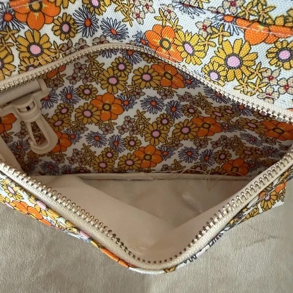 Add some color to your wardrobe with this Floral Orange and Yellow Backpack. - Picture 6 of 10